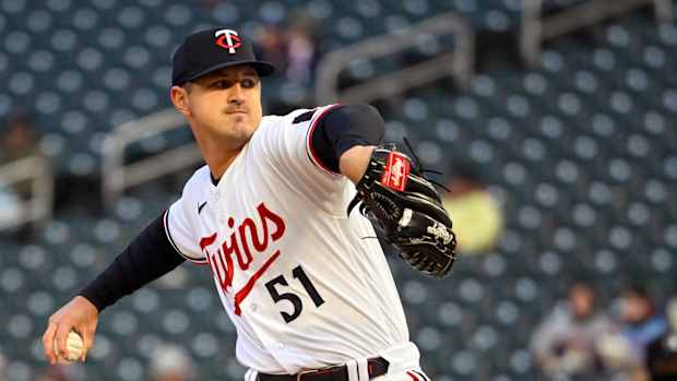 Apr 21, 2023; Minneapolis, Minnesota, USA; Minnesota Twins pitcher Tyler Mahle (51) delivers a pitch against the Washington Nationals at Target Field. Mandatory Credit: Nick Wosika-USA TODAY Sports  